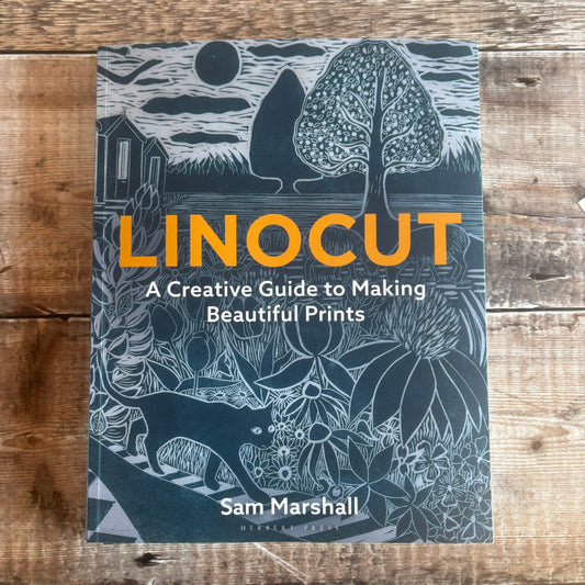 Signed copy of my LINOCUT book  ( creased pages)